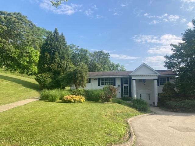 1014 State Rd, Monessen, PA 15062 - view of front of property with a front yard and stucco siding