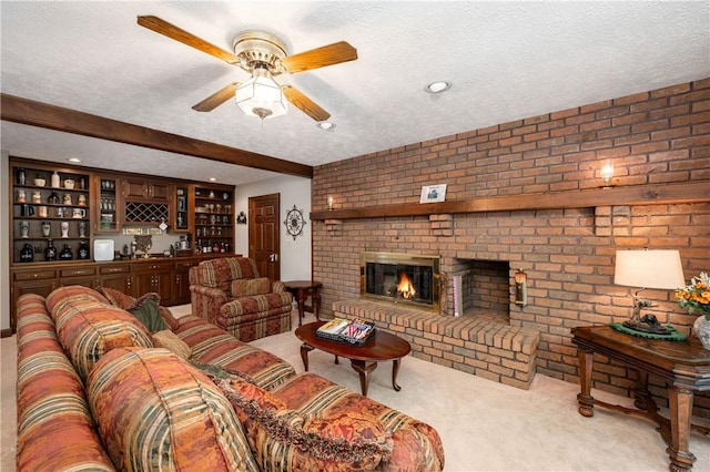 109 Old Hickory Ln, Pine Twp Mer, PA 16127 - living area with light colored carpet, beam ceiling, a textured ceiling, ceiling fan, and a brick fireplace