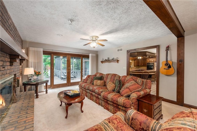 109 Old Hickory Ln, Pine Twp Mer, PA 16127 - living room with ceiling fan, a brick fireplace, a textured ceiling, and carpet floors