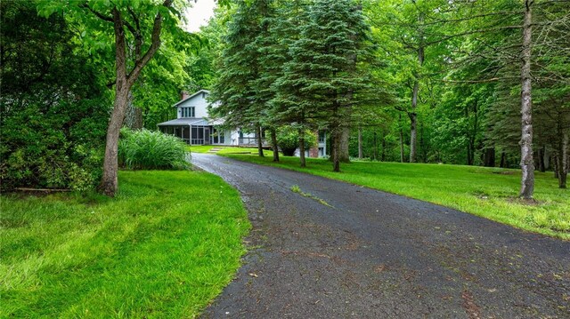 124 Oak Ln, Adams Twp, PA 16046 - view of front of property featuring a front lawn and driveway