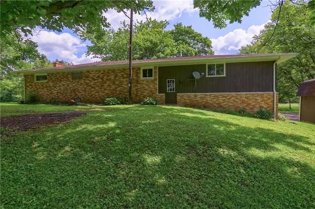 3473 Old Pulaski Rd, Wilmington Twp, PA 16105 - view of front of property with brick siding, a front lawn, and a chimney