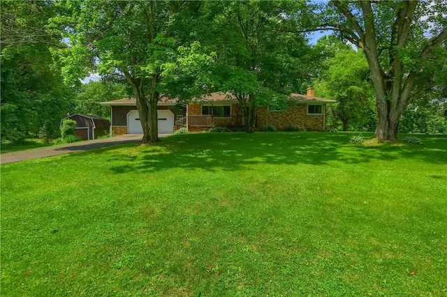3473 Old Pulaski Rd, Wilmington Twp, PA 16105 - view of grassy yard with driveway and a garage