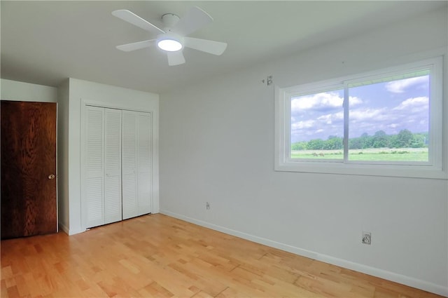 3473 Old Pulaski Rd, Wilmington Twp, PA 16105 - unfurnished bedroom with light wood finished floors, a closet, and a ceiling fan
