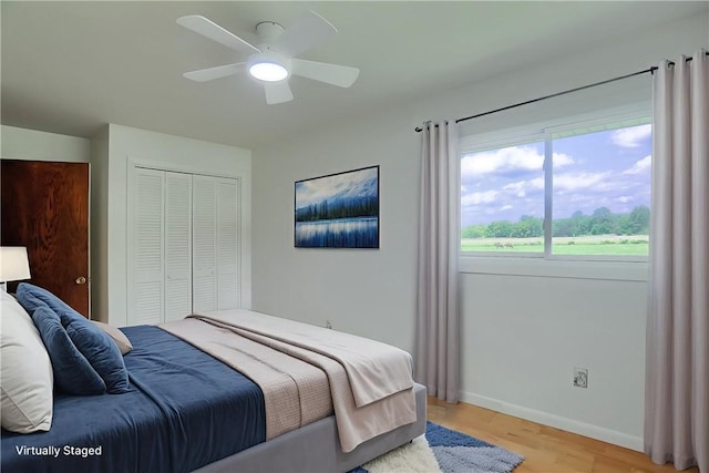3473 Old Pulaski Rd, Wilmington Twp, PA 16105 - bedroom featuring light wood-type flooring, a closet, and a ceiling fan