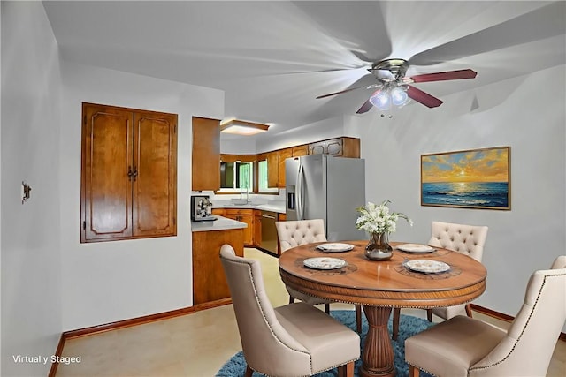 3473 Old Pulaski Rd, Wilmington Twp, PA 16105 - dining room featuring a ceiling fan and baseboards