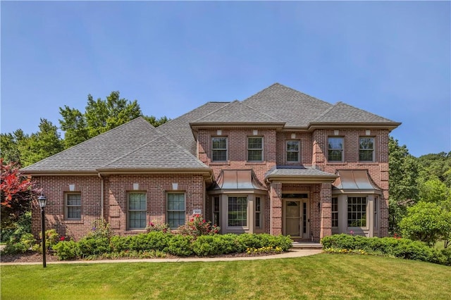 360 Steeplechase Dr, Cranberry Twp, PA 16066 - view of front facade with brick siding, a front lawn, and roof with shingles