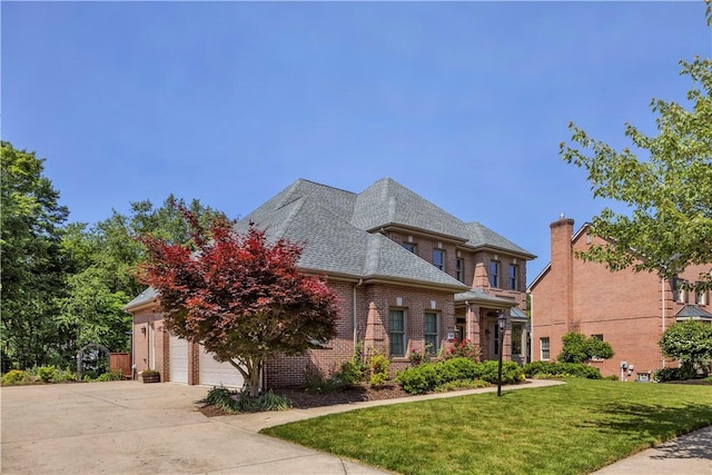 360 Steeplechase Dr, Cranberry Twp, PA 16066 - view of front facade with brick siding, a front yard, and driveway
