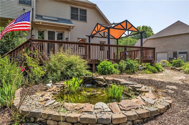 360 Steeplechase Dr, Cranberry Twp, PA 16066 - rear view of house featuring a deck and a small pond