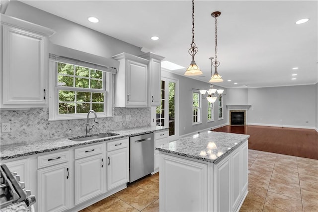 360 Steeplechase Dr, Cranberry Twp, PA 16066 - kitchen with appliances with stainless steel finishes, backsplash, healthy amount of natural light, recessed lighting, and a center island