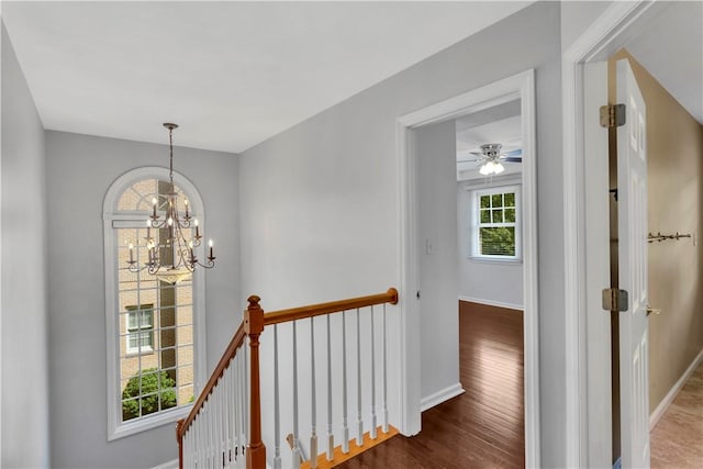 360 Steeplechase Dr, Cranberry Twp, PA 16066 - hall featuring an upstairs landing, a chandelier, and wood finished floors