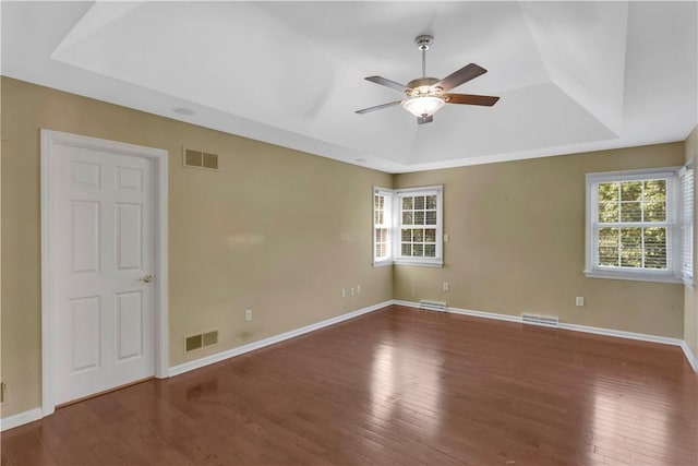 360 Steeplechase Dr, Cranberry Twp, PA 16066 - empty room featuring a raised ceiling, a ceiling fan, and wood finished floors