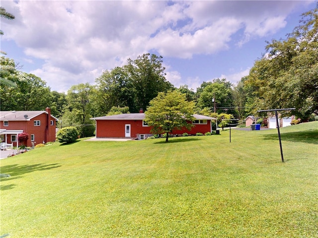 306 Cherokee Dr, Center Twp But, PA 16001 - view of grassy yard featuring view of scattered trees