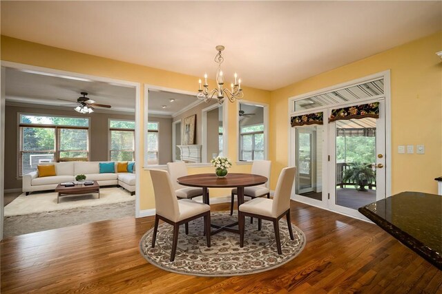 130 Sewickley Farm Cir, Marshall, PA 16046 - dining area with ceiling fan, dark wood-style flooring, a chandelier, and ornamental molding