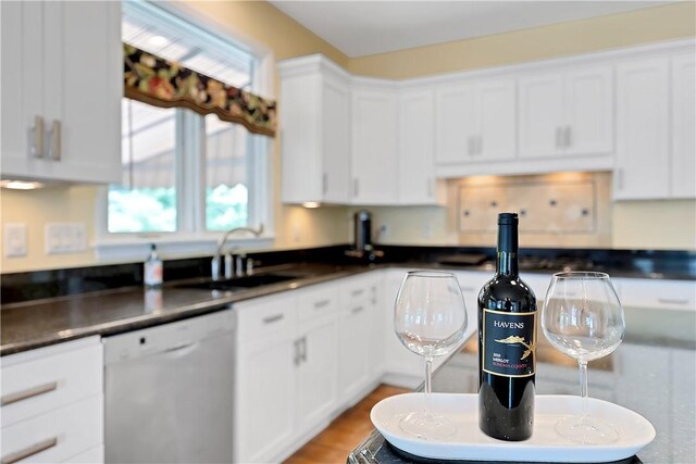 130 Sewickley Farm Cir, Marshall, PA 16046 - kitchen featuring white dishwasher, white cabinetry, and dark countertops
