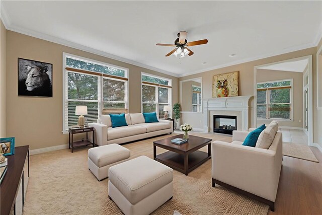 130 Sewickley Farm Cir, Marshall, PA 16046 - living room featuring ornamental molding, ceiling fan, plenty of natural light, and a glass covered fireplace
