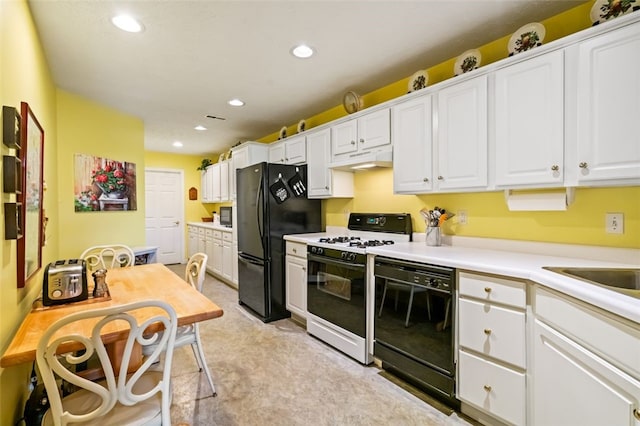 6422 Jefferson Pointe Cir, Jefferson Hills, PA 15025 - kitchen with black appliances, under cabinet range hood, white cabinetry, recessed lighting, and light countertops