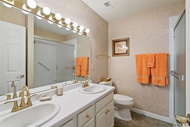 6422 Jefferson Pointe Cir, Jefferson Hills, PA 15025 - bathroom featuring a shower with shower door, double vanity, and a textured ceiling