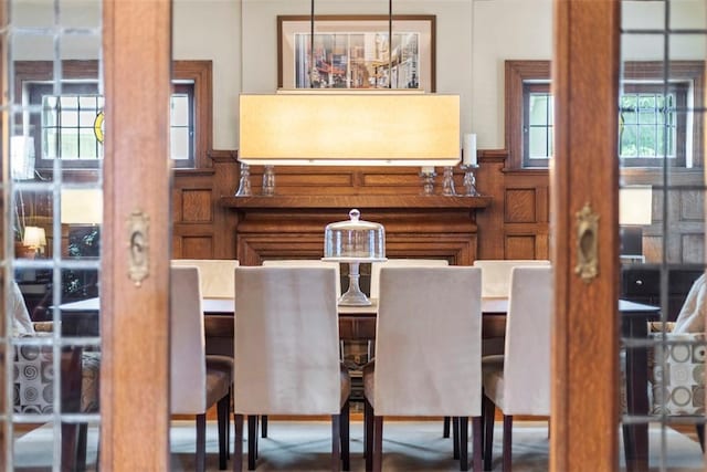6909 Meade St, Point Breeze, PA 15208 - dining area with wainscoting and a decorative wall