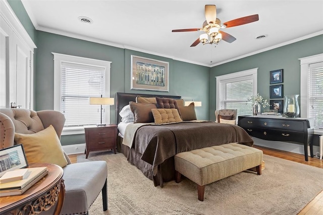 6909 Meade St, Point Breeze, PA 15208 - bedroom with ornamental molding, light wood-style floors, and ceiling fan