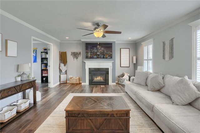112 Norfolk Dr, Buffalo Twp But, PA 16055 - living area with wood finished floors, a ceiling fan, recessed lighting, a glass covered fireplace, and ornamental molding