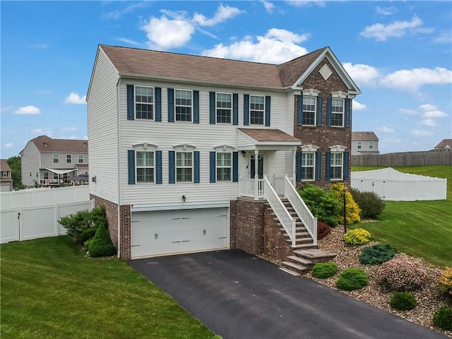 112 Norfolk Dr, Buffalo Twp But, PA 16055 - view of front facade featuring a garage, driveway, and brick siding