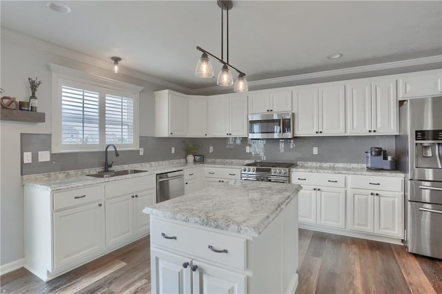 112 Norfolk Dr, Buffalo Twp But, PA 16055 - kitchen with stainless steel appliances, wood finished floors, white cabinets, crown molding, and light stone counters
