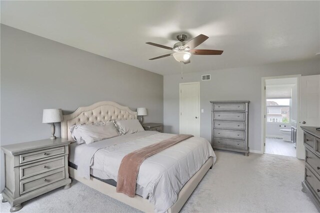 112 Norfolk Dr, Buffalo Twp But, PA 16055 - bedroom featuring light carpet, connected bathroom, and a ceiling fan