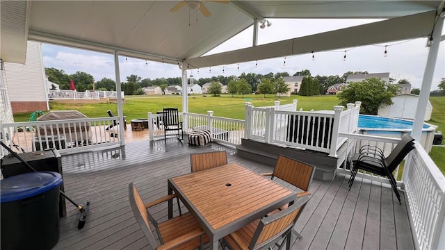 110 Mohawk Dr, Buffalo Twp But, PA 16055 - wooden deck with outdoor dining space, a storage unit, and a yard