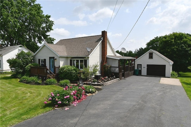 794 Mercer Rd, Center Twp But, PA 16001 - view of front of property with a garage, an outbuilding, a chimney, and a front lawn