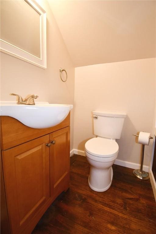 794 Mercer Rd, Center Twp But, PA 16001 - half bath featuring vaulted ceiling, vanity, and wood finished floors