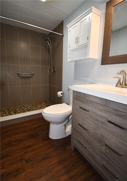 794 Mercer Rd, Center Twp But, PA 16001 - full bath featuring vanity, tiled shower, and wood finished floors