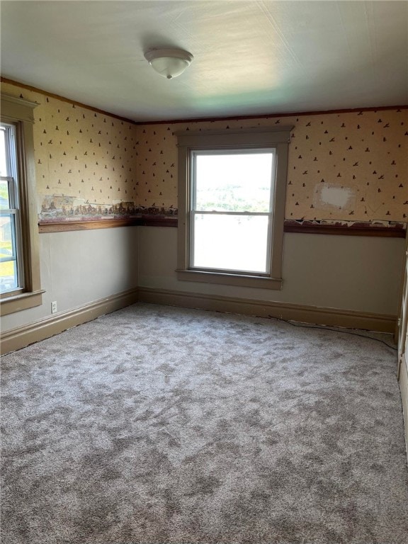 114 N Main St, Masontown, PA 15461 - carpeted spare room with plenty of natural light and wallpapered walls