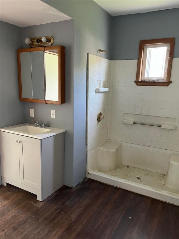 114 N Main St, Masontown, PA 15461 - bathroom with a shower stall, vanity, and wood finished floors