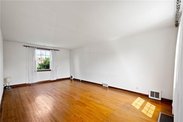 33 S Vireo Dr, Kennedy Twp, PA 15136 - unfurnished room featuring hardwood / wood-style floors and baseboards