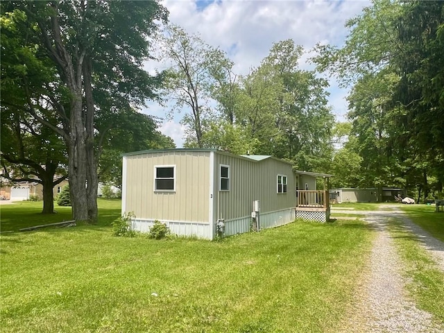 25 Coolspring St, Coolspring Twp, PA 16137 - view of property exterior with a yard and driveway