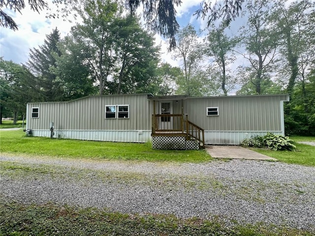 25 Coolspring St, Coolspring Twp, PA 16137 - manufactured / mobile home featuring a front lawn