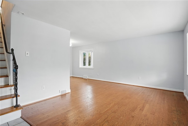 3917 Beechwood Blvd, Squirrel Hill, PA 15217 - spare room featuring stairs and wood-type flooring