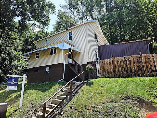 1243 2nd St, Brownsville, PA 15417 - view of front of property featuring stairway and a chimney