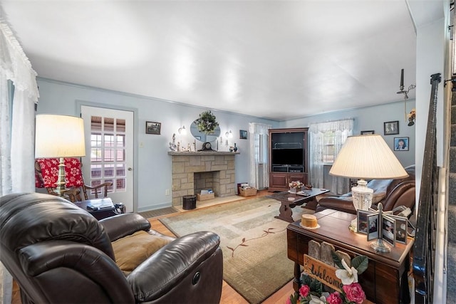 3337 Churchview Ave, Baldwin Boro, PA 15227 - living room with healthy amount of natural light, wood finished floors, and a stone fireplace