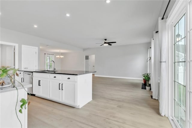 313 Camden Dr, Lehigh Twp, PA 16063 - kitchen with dishwasher, ceiling fan, dark countertops, light wood-style floors, and recessed lighting
