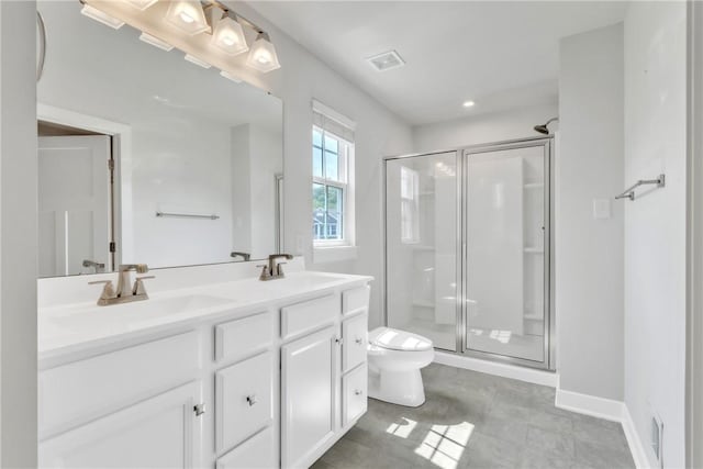 313 Camden Dr, Lehigh Twp, PA 16063 - full bath featuring a shower stall, double vanity, and tile patterned flooring