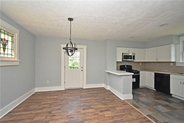 2300 Palm Beach Ave, Beechview, PA 15216 - kitchen with black appliances, light countertops, decorative backsplash, white cabinets, and a chandelier