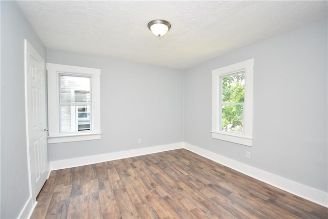 2300 Palm Beach Ave, Beechview, PA 15216 - empty room featuring dark wood finished floors and a textured ceiling
