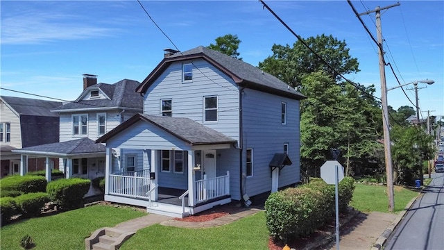 2300 Palm Beach Ave, Beechview, PA 15216 - view of front of property with a porch, a front yard, and a shingled roof