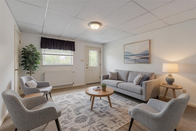 435 Walde St, Mount Oliver, PA 15210 - living area with radiator, a paneled ceiling, and carpet