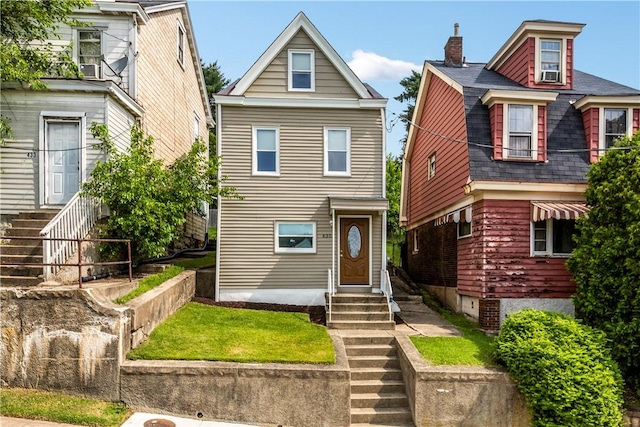 435 Walde St, Mount Oliver, PA 15210 - view of front of home with entry steps, a chimney, and a shingled roof