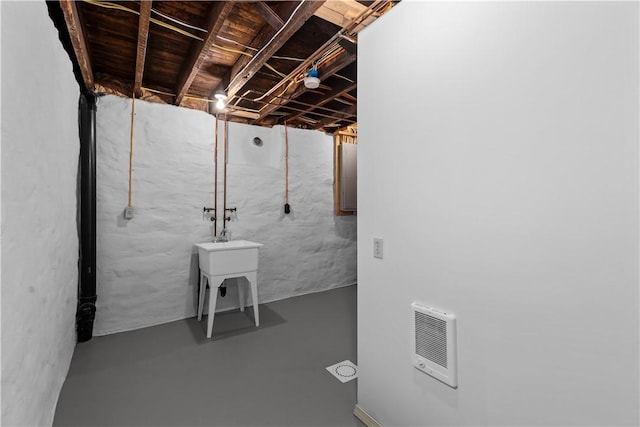 435 Walde St, Mount Oliver, PA 15210 - unfinished basement featuring heating unit and electric panel
