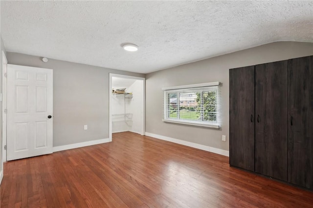 330 Delaney Dr, Wilkins Twp, PA 15235 - unfurnished bedroom with wood finished floors, a textured ceiling, and a closet