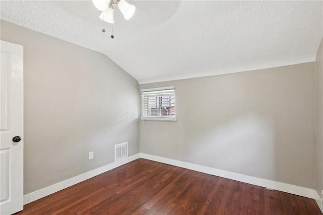 330 Delaney Dr, Wilkins Twp, PA 15235 - unfurnished room with lofted ceiling, a ceiling fan, wood finished floors, and a textured ceiling