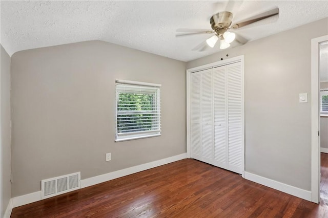 330 Delaney Dr, Wilkins Twp, PA 15235 - unfurnished bedroom with a closet, a textured ceiling, wood finished floors, lofted ceiling, and ceiling fan